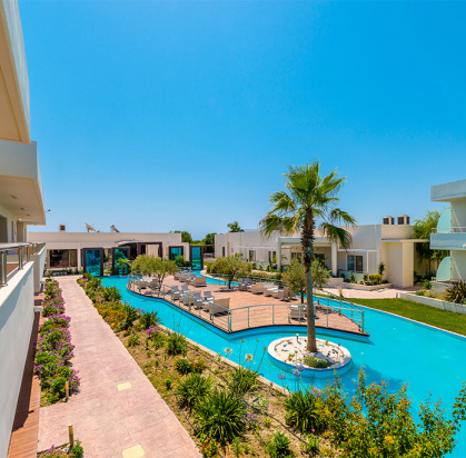 Hôtel COOEE Afandou Bay Resort Suites 5*, Séjour Grèce & ses îles, Rhodes par Ôvoyages Hôtel COOEE Afandou Bay Resort Suites 5*, Séjour Grèce & ses îles, Rhodes par Ôvoyages